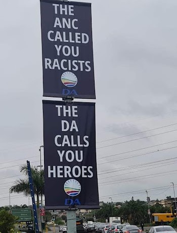 DA removes &#39;racists v heroes&#39; posters, apologises